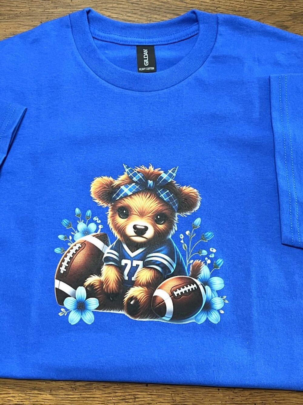 Highland Cow Football Royal Blue Adult Medium T-shirt